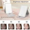Rechargeable Travel Makeup Mirror with 80 LED Lights, Portable Lighted Makeup Mirror, 3 Color Dimmable Lighting Vanity Mirror, 360° Rotation Touch Screen Compact Tabletop Folding Cosmetic Mirror Mini